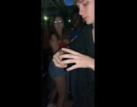 Guy in blue hat makes card spin in air crowd goes crazy 
2