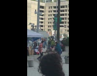 Guy dance alone at political rally