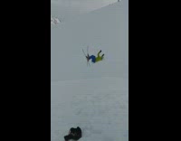Guy backflip fail blue pants red skis 