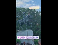 Man climbs George Washington statue at Union square park