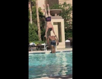 Two men balance gymnast swimming pool music Part 1