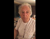 Old lady grandma offers shrimp cocktail 