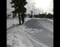 Snowboarder rides over ramp then falls on back fail 