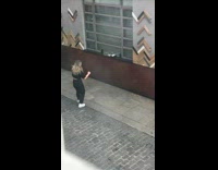 Blonde girl black pants dance outside window