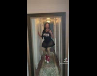 Lady Walks Toward Mirror as she Sings