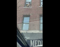 Guy uses fishing rod to retrieve item from friend 