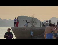 Tourist handstand fail cement platform black leggings 