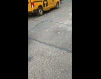 Guy loads long couch into taxi 