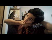 Man pretends to snap its neck with bubble wrap as the sound