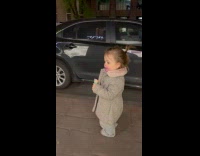 Girl with ice cream mess around mouth