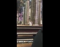 man white sweater selfie stick church