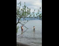 Girl black swimsuit ballerina dance in water