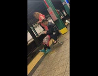 Guy sits on chair next to tracks 