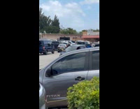 Man films footage from shootout from warehouse