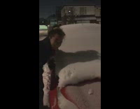 Girl leaves face imprint in snow 