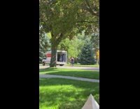 Man plays bass guitar inside U-Haul truck Video Shoot