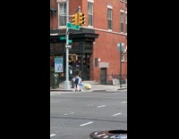 Collab WINY - Woman cross street ride motorized wheeled suitcase