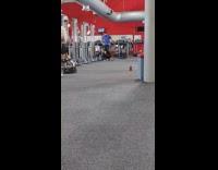 White hair woman pull down machine gym