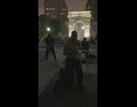 Two guys play saxophone drums park