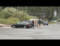 Black sweater guy dances parking lot girl 