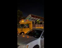 Dj playing at a customized school bus 