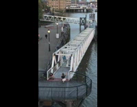 Black shirt girl squats poses white bridge 