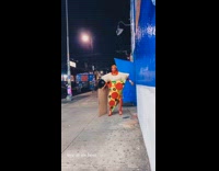 Woman in pizza costume with last call sign 