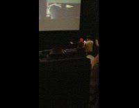 Collab IITW - Woman in Deadpool costume dances inside cinema