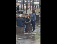 Older couple girl shake move hands table