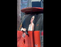 Car rear wiper with waving man sticker