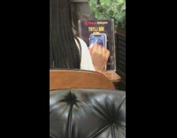 Girl restaurant table facebook instagram live phone 