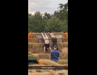 Woman black dress haystack pumpkin farm pictorial Part 2