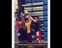 Three bullies hold up and pin kid to the bleachers, teacher tells them to put kid down