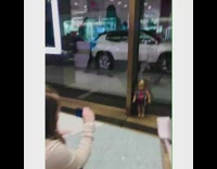 Girl photoshoots her doll