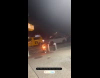 Garbage in trash can burn street night