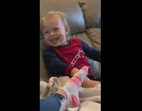 Red shirt little boy says stupid couch