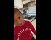 Boy makes disgusted face at guy