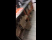 Black broom worker breaks lower window  glass