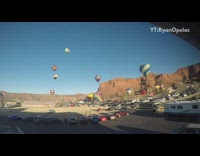 Time lapse hot air balloons fly mountain 