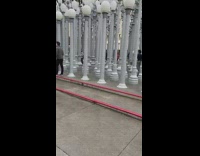 Crowded museum installation lamps