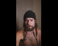 Coronavirus conspiracy theories black beanie guy