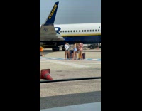 Collab IITW - Group of Ladies Take Selfies on Airplane Runway