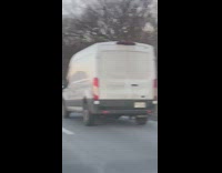 Van with fedex ground written on window 