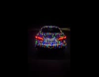 Guy decorated car with thousand Christmas lights