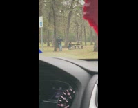 Couple take selfie at park