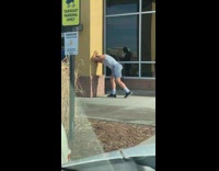 Guy blue top stretch exercise laugh car