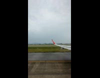 Plane take off through rain timelapse video