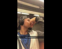 man in blue shirt headphones records person yelling