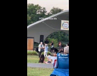 Elderly Couple Happily Dance to Band Performance