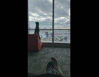 Woman spreads legs airport for video